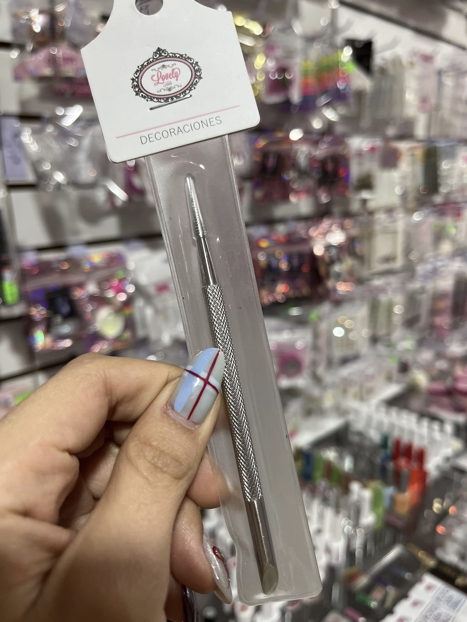 Empujador de cutícula lovley