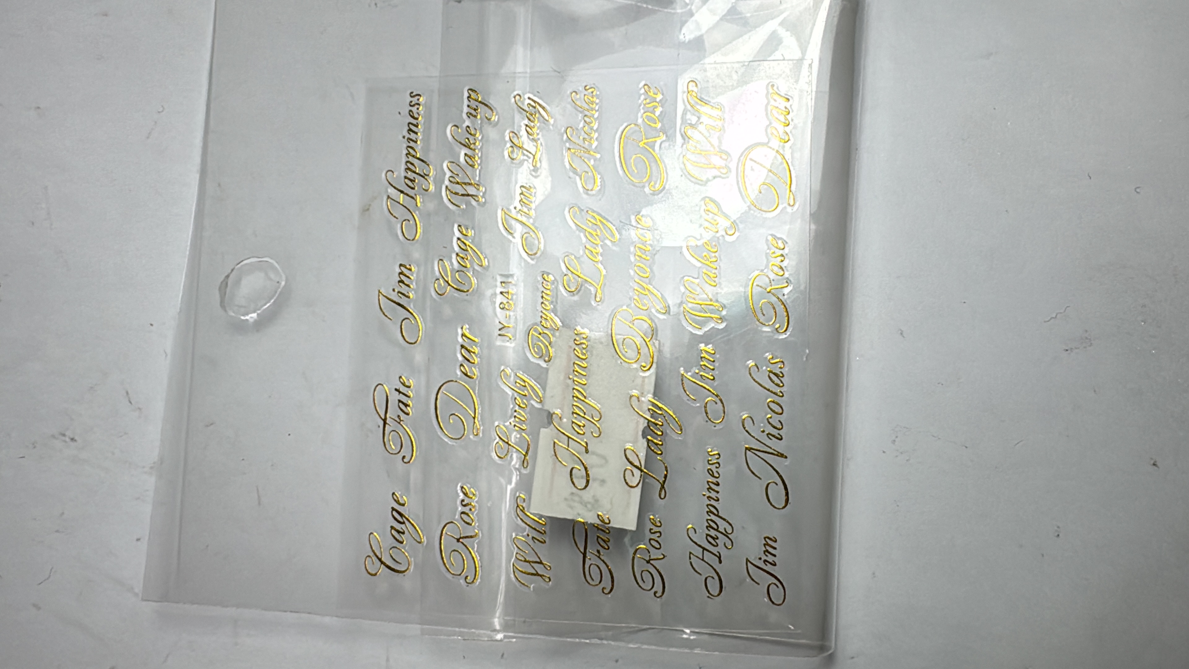 Sticker Mini Dorado Nombres (Cage)