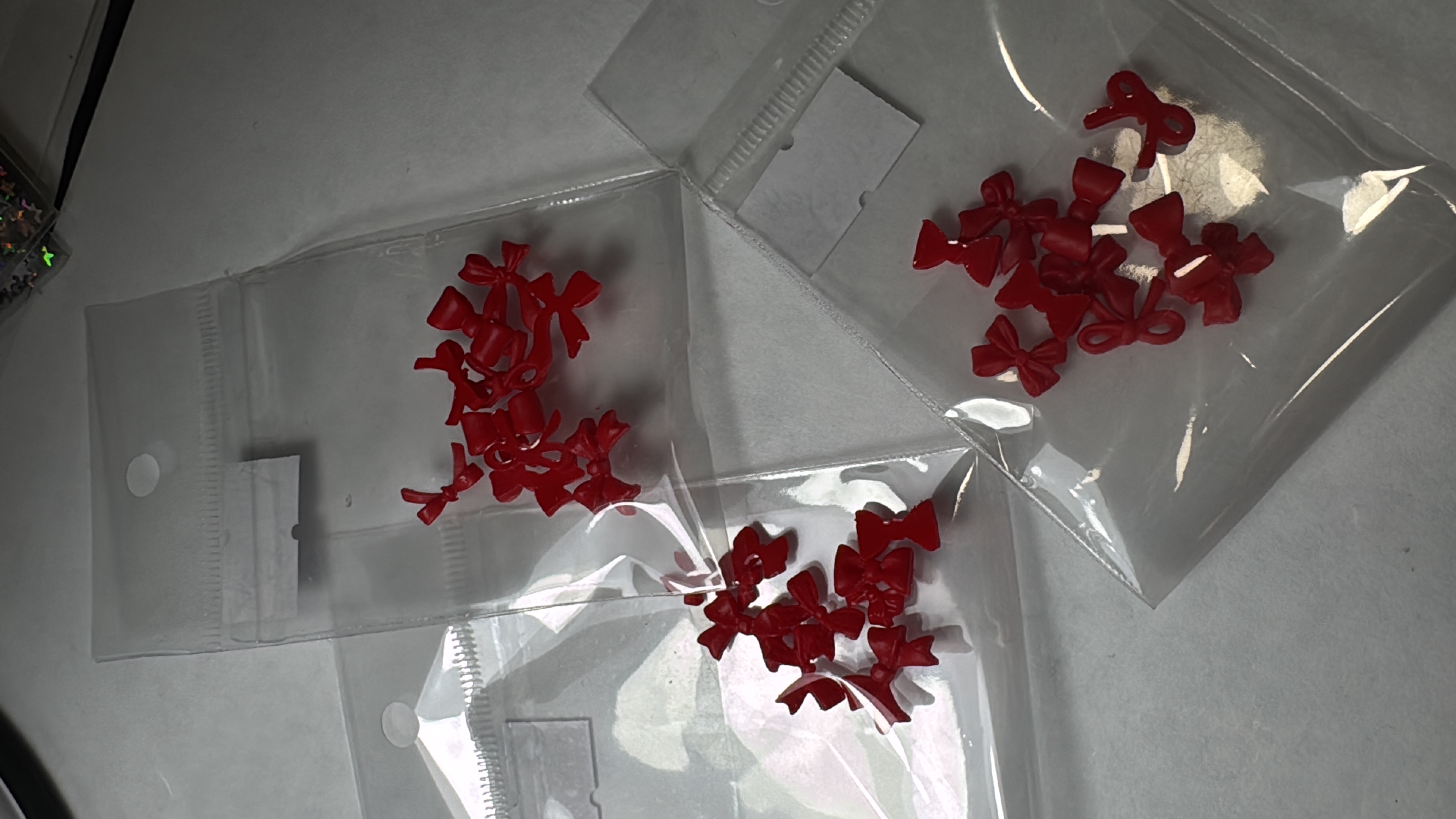 Paquete de moños rojos 5 pares mix